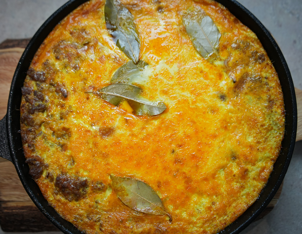 south african bobotie baked in cast iron skillet