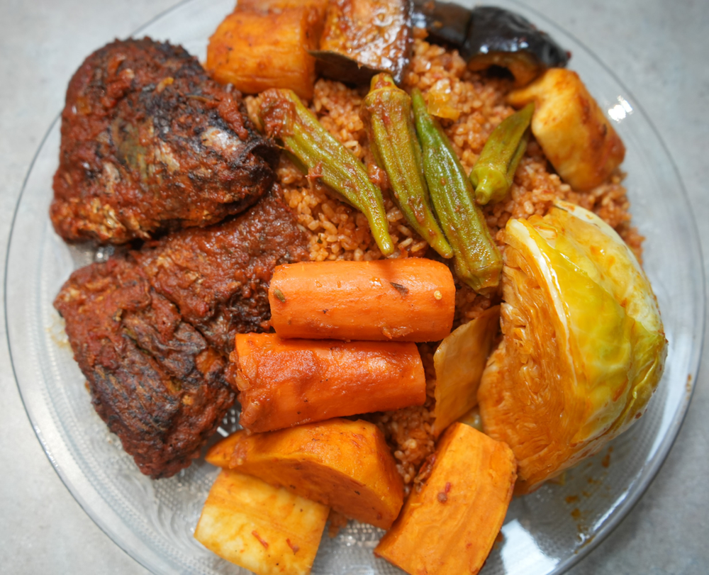 a plate of thieboudienne (senegalese jollof)