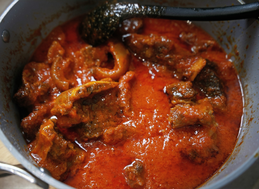 a pot of west african red stew