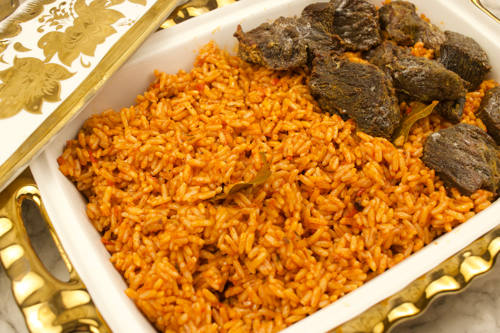 Nigerian Jollof Rice paired with fried meats