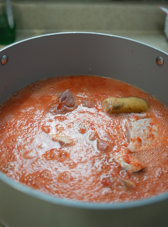 a pot of goat meat and pepper mix