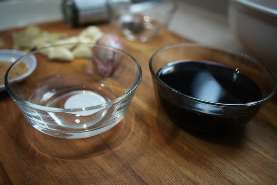 bowls of soy sauce and vinegar