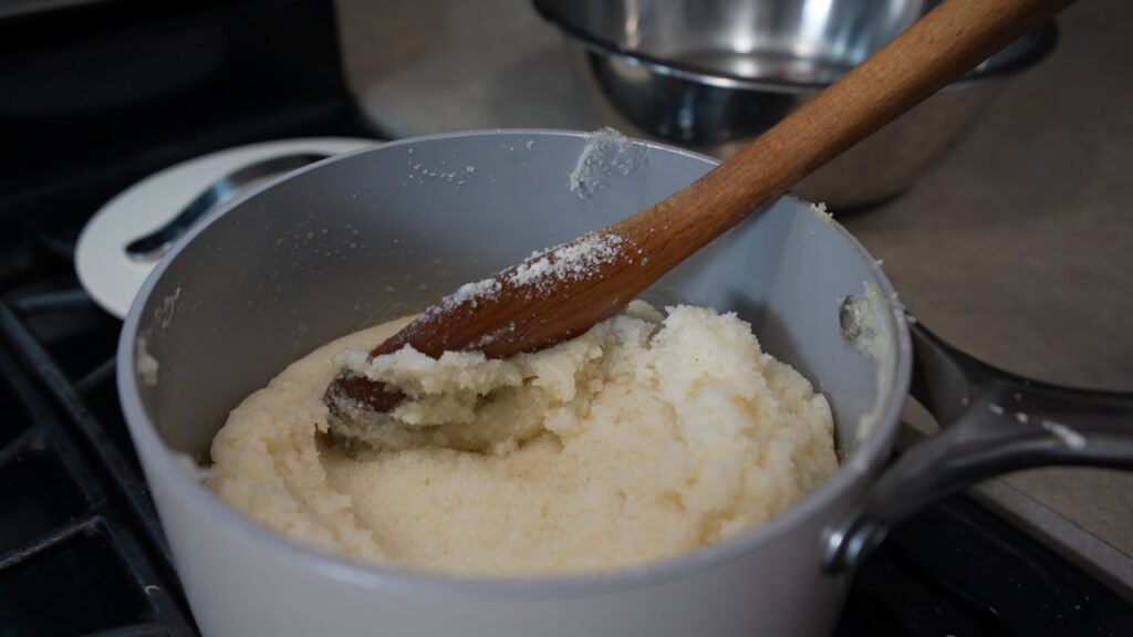 Mixing Sadza in Boiled water