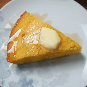 cornbread slice topped with butter