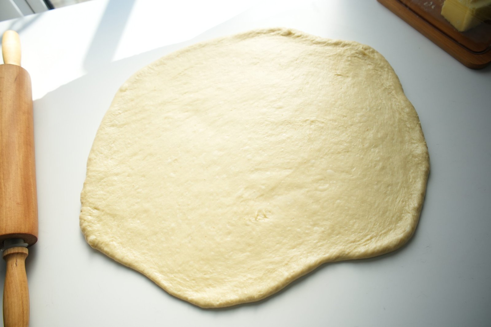 dough rolled out into an inch thickness