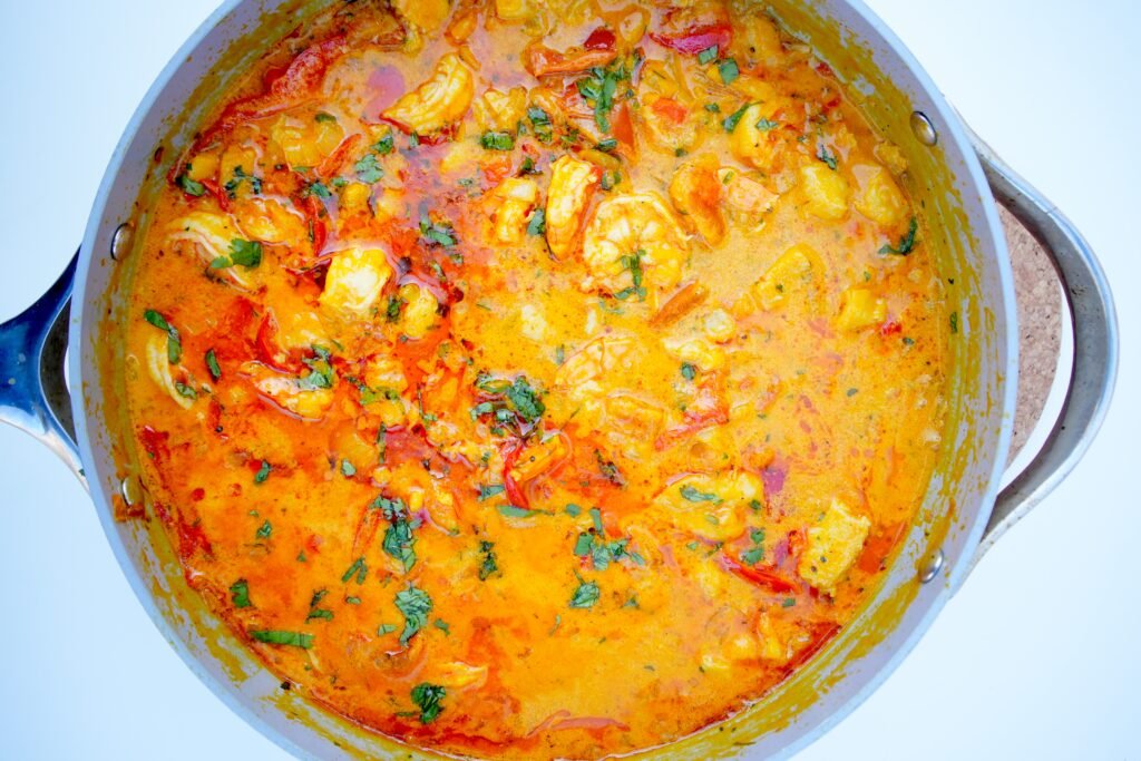 a large pan of moqueca seafood stew