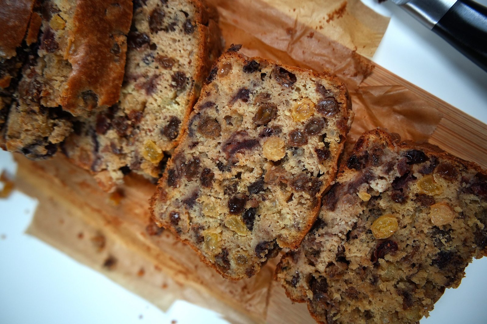 slices of tea loaf laid out on wooden board